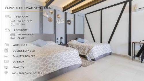 1 dormitorio con 2 camas en 3Ph Amazing 2Bdrm 2bath private terrace fits 10, en Ciudad de México
