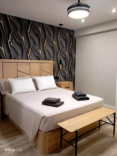 En eller flere senge i et værelse på Vivienda Premium Estación- Nido 2