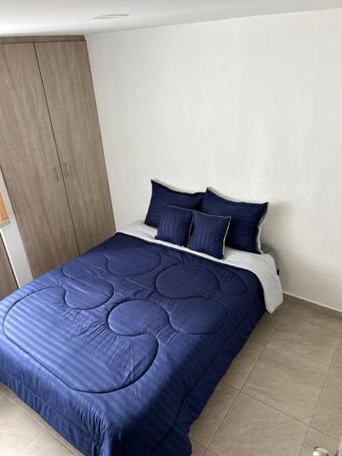 Ένα ή περισσότερα κρεβάτια σε δωμάτιο στο Carretera a los Nevados y Termales