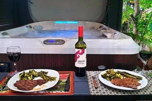 Fotografie z fotogalerie ubytování Petit loft avec jacuzzi et terrase exotique privé v destinaci Granby