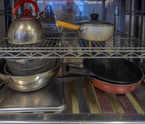 two pots and pans sitting on a shelf in an oven at Nasu First Villa - Vacation STAY 81161v in Nasu-yumoto