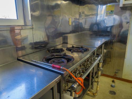 a kitchen with a stove top oven in a room at Nasu First Villa - Vacation STAY 81161v in Nasu-yumoto