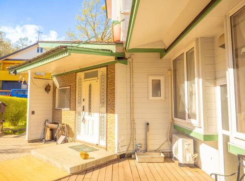 a house being remodeled with a front porch at Nasu First Villa - Vacation STAY 81161v in Nasu-yumoto