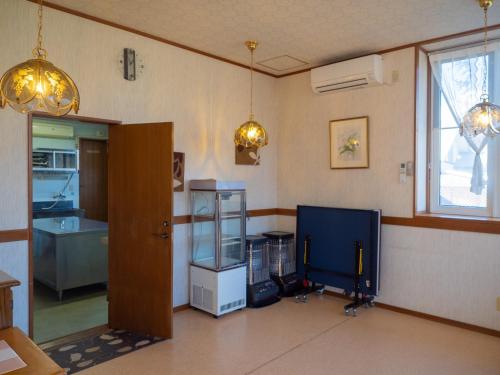 a room with a room with a kitchen and a window at Nasu First Villa - Vacation STAY 81161v in Nasu-yumoto