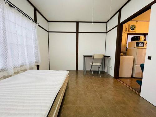 Postel nebo postele na pokoji v ubytování Sakura Kan - Vacation STAY 19677