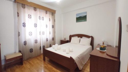a bedroom with a bed with candles on it at A&B Apartments - Afonso in Macedo de Cavaleiros