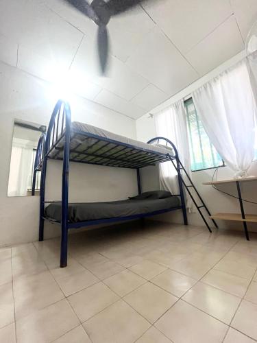Letto o letti in una camera di Casa bohio surf