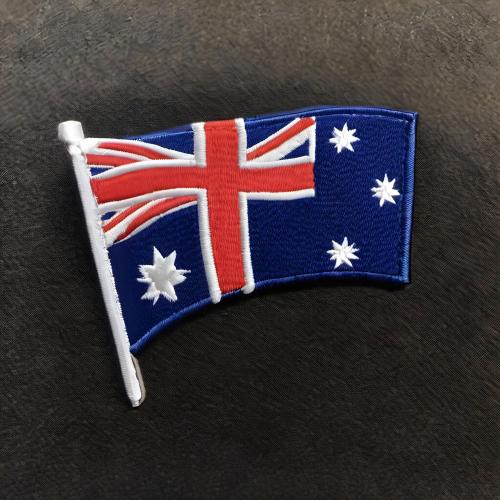 a small flag of australia on a table at Turismo Associativo Giovanile asd bidrino in Borgofranco dʼIvrea