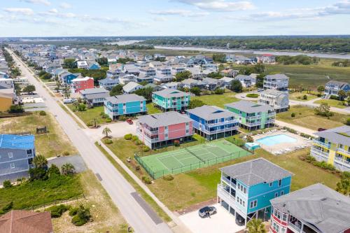 an aerial view of a city with a tennis court at Captain's Villa 6-B in Holden Beach