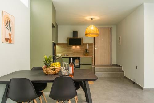 a dining room with a table and chairs at Sofia Villa in Krousón