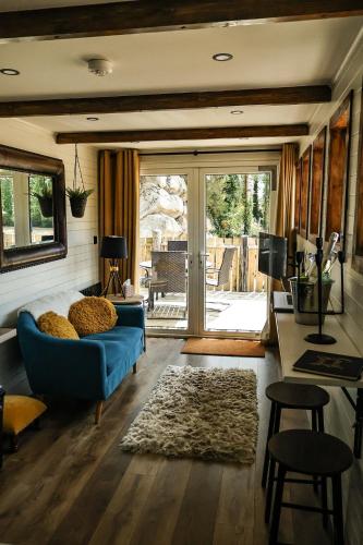 Posezení v ubytování Greenvale Cabins