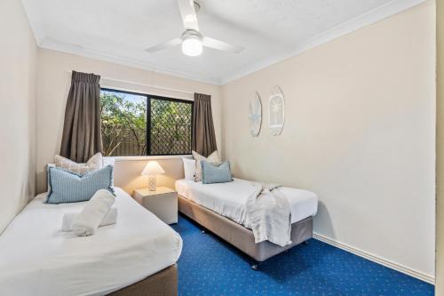 Katil atau katil-katil dalam bilik di Turtle Beach Getaway - Family Paradise by the Sea