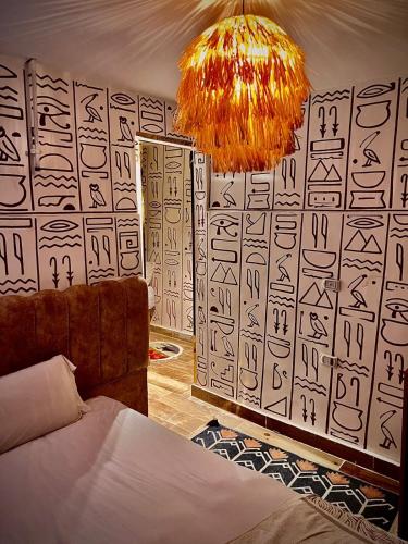 Cama o camas de una habitación en Farsha Pyramids Inn
