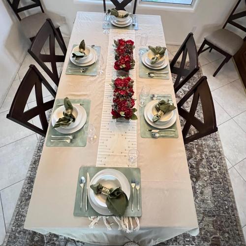 a long table with plates of food on it at Mountain View Oasis in Hemet