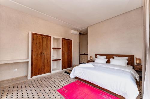 Ένα ή περισσότερα κρεβάτια σε δωμάτιο στο Villa de Luxe avec 3 Chambres