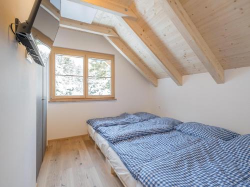 Una cama o camas en una habitación de Bergzauber