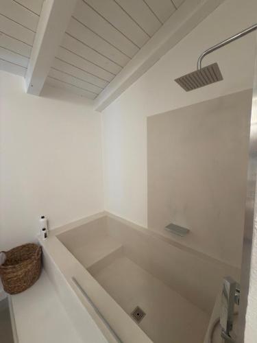 Un baño de M'Hutel
