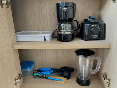 Küche/Küchenzeile in der Unterkunft Comodo Apartamento Edificio urban