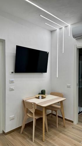 TV a/nebo společenská místnost v ubytování I Racconti del Fiume