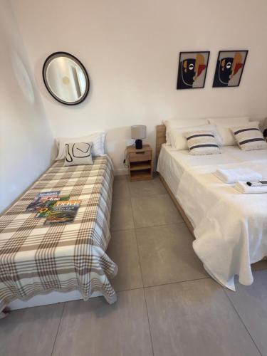 Cama o camas de una habitación en M'Hutel
