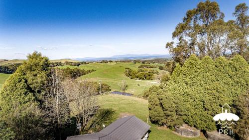 an aerial view of a golf course with trees at Ameys Ridge Prom Views in Foster