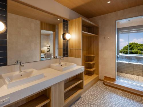 Koupelna v ubytování KAMENOI HOTEL Ako