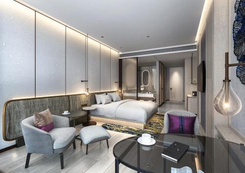 Un ou plusieurs lits dans un hébergement de l'établissement Grand Nikko Bangkok Sathorn