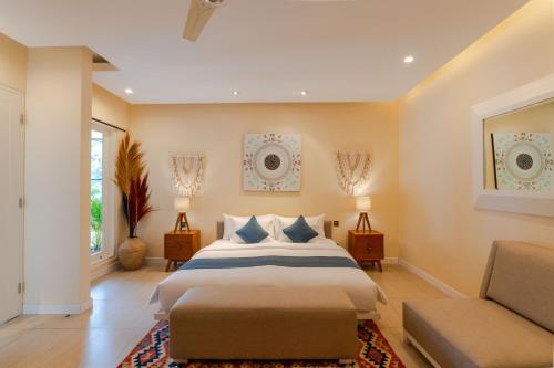 Ένα ή περισσότερα κρεβάτια σε δωμάτιο στο Boholuma Villas