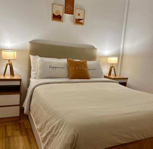 Postel nebo postele na pokoji v ubytování Obelisco Suite