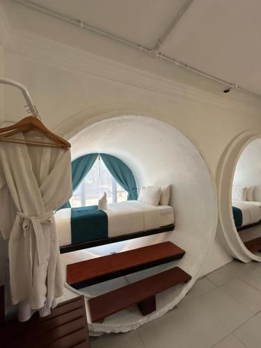 Voodi või voodid majutusasutuse Villa Bari Loft toas