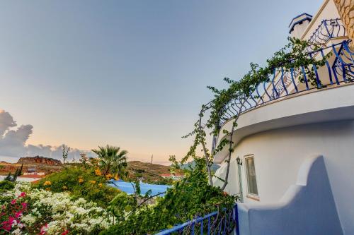 a building with vines growing on the side of it at Datca Villa Asina in Datca