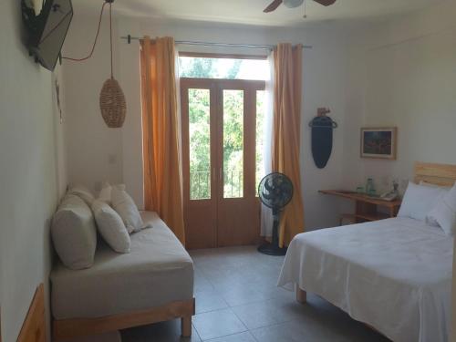 Postel nebo postele na pokoji v ubytování Santa Cecilia Hotel