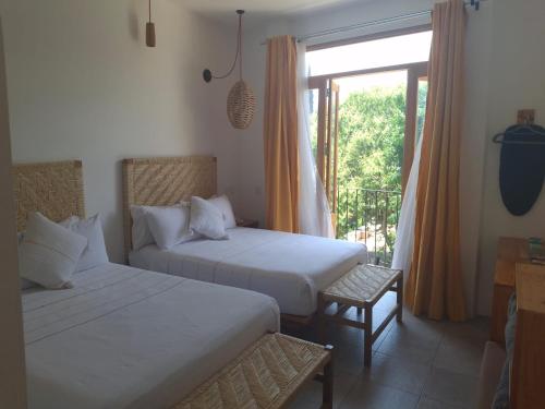 Postel nebo postele na pokoji v ubytování Santa Cecilia Hotel
