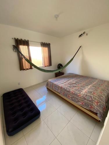 Postel nebo postele na pokoji v ubytování BIA BELA Aluguéis por Temporada em BHS