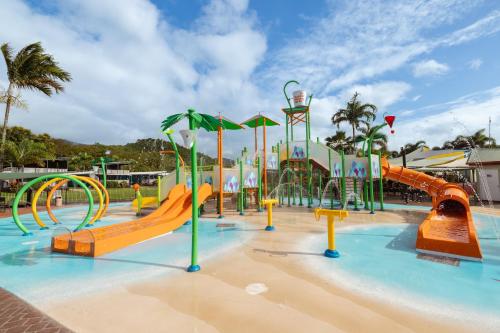 a water park with a playground with slides and rides at Ingenia Holidays Cairns Coconut in Cairns