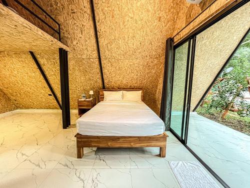 Katil atau katil-katil dalam bilik di Manta Resort