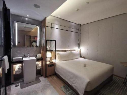 Cama o camas de una habitación en Shenzhen Apex Hotel (Technology Park Branch)