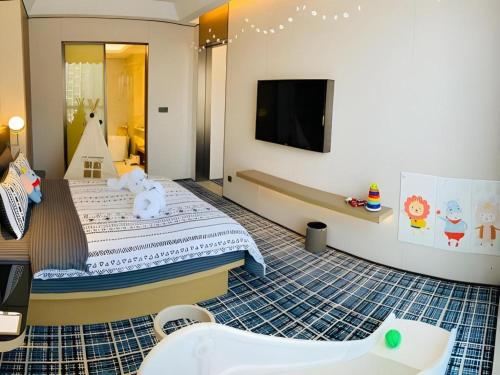 Ένα ή περισσότερα κρεβάτια σε δωμάτιο στο Onejee Hotel Shenzhen