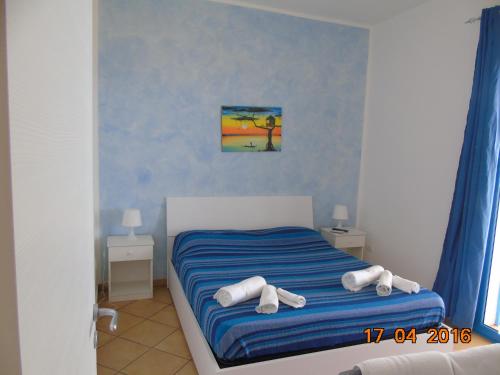 Posteľ alebo postele v izbe v ubytovaní Villa Vittoria