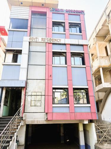 a building with a sign that reads gut registry at Aditi Residency New Digha Near Sea Beach in Digha