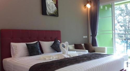 Postel nebo postele na pokoji v ubytování Greenseaview Resort