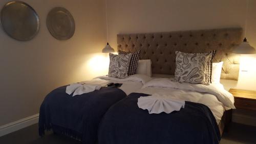 Cama o camas de una habitación en The Nottingham Road Hotel