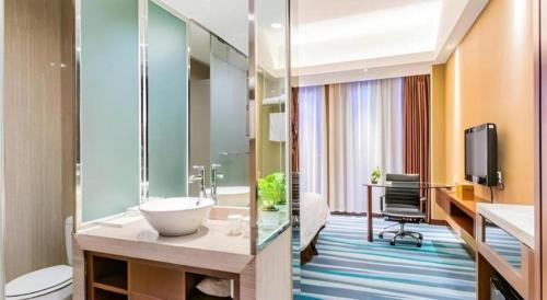 Koupelna v ubytování Jinjiang Metropolo Shaoxing Keqiao Wanda Plaza