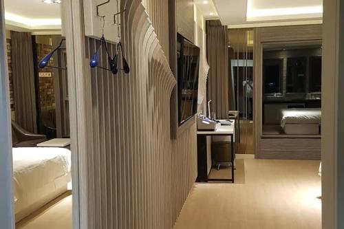 Ένα ή περισσότερα κρεβάτια σε δωμάτιο στο Pohang Hotel View