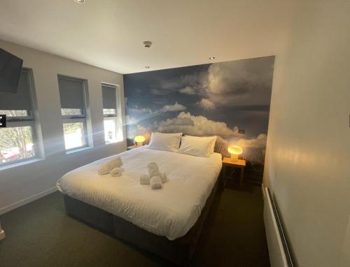 Ένα ή περισσότερα κρεβάτια σε δωμάτιο στο Altezza 2 bedroom apartments