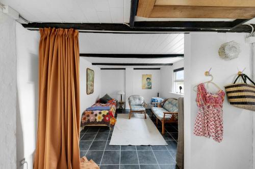 Postel nebo postele na pokoji v ubytování Cozy Cottage On North Bornholm