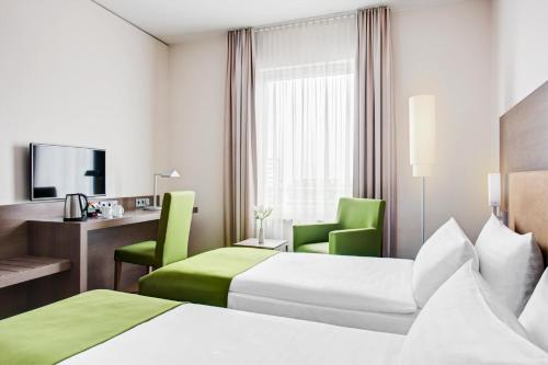 Katil atau katil-katil dalam bilik di IntercityHotel Mainz