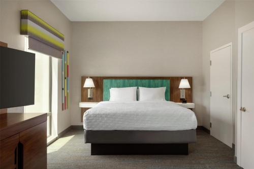 Ένα ή περισσότερα κρεβάτια σε δωμάτιο στο Hampton Inn Derby-Wichita Southeast