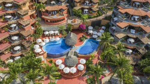 an aerial view of a resort with a swimming pool at Hilton Grand Vacations Club Zihuatanejo in Zihuatanejo