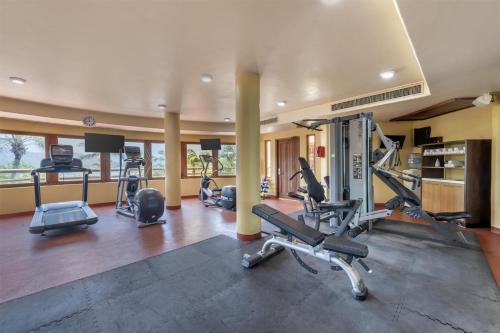 a gym with several exercise bikes in a room at Hilton Grand Vacations Club Zihuatanejo in Zihuatanejo